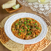 Guiso carretero de cerdo con arveja y mandioca